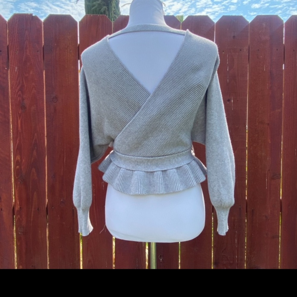 Saints + Secrets Faux Wrap Ribbed Ruffle Hem
Pink Sweater Size L - Picture 2 of 5